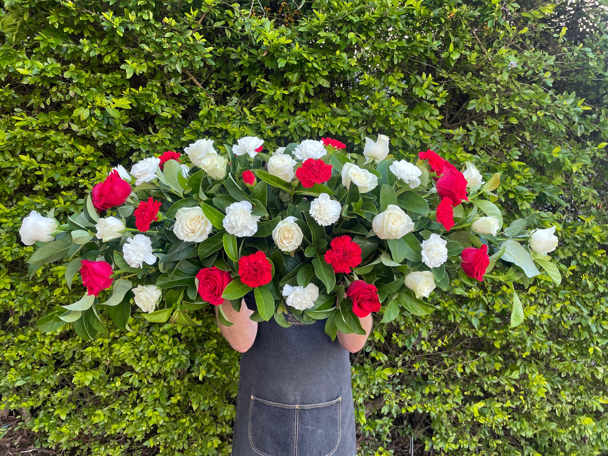 RED & WHITE ROSE & CARNATION MIXED CASKET SPRAY