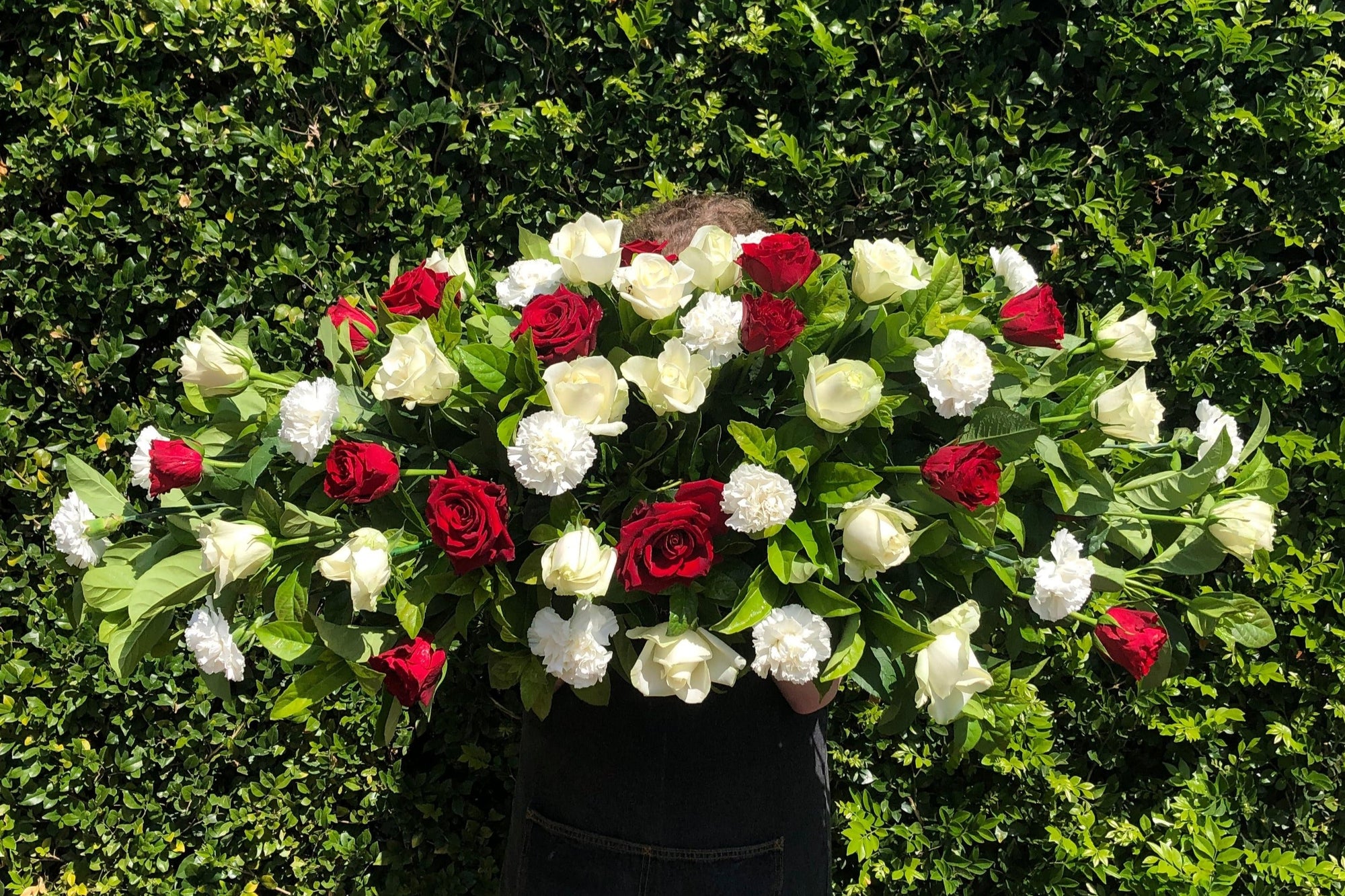 RED & WHITE ROSE & CARNATION MIXED CASKET SPRAY