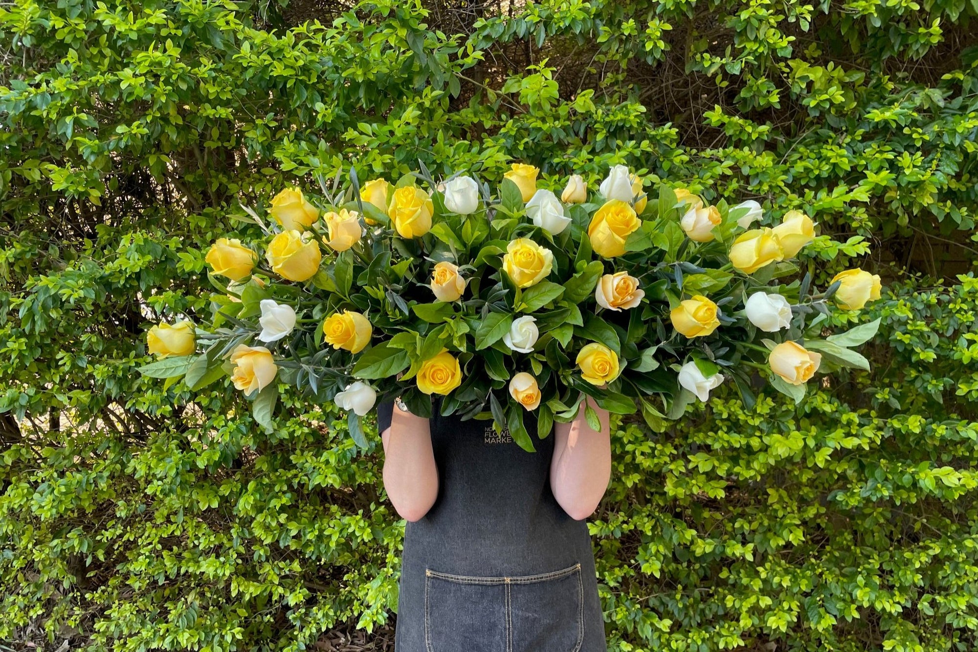 TWO TONE ROSE CASKET SPRAY